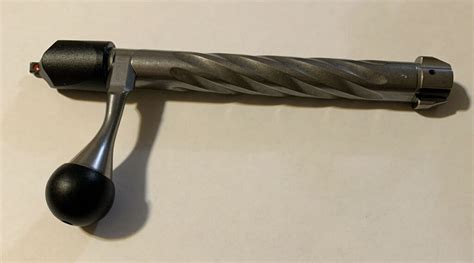 - Barrel Factory Fluted and threaded (MT14x1) - Bolt black Teflon coated with large bolt knob. . Tikka t3 fluted bolt for sale